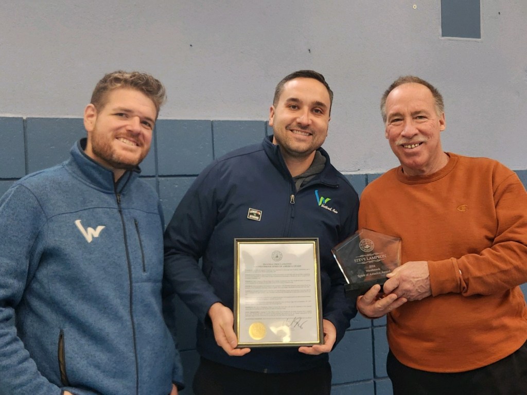Steve Lampron, at right, receives Westbrook’s 2024 Spirit of America Award with David Morse and Michael Foley.